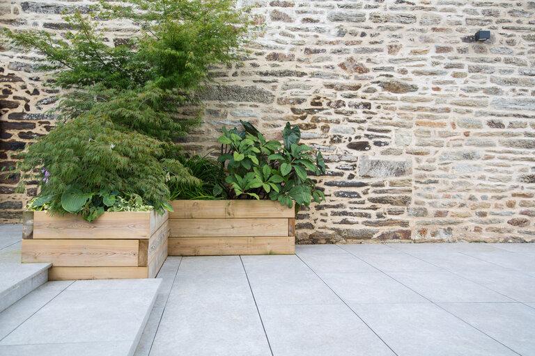 Moderne Gartengestaltung und Terrassenbau mit Naturstein